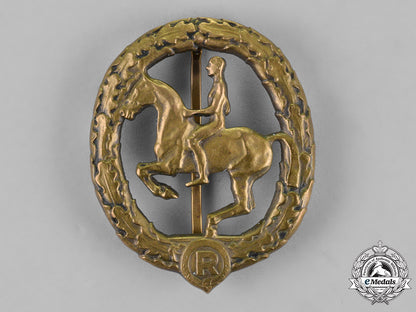 germany._an_equestrian_badge_and_stick_pin,_in_bronze,_by_christian_lauer_c18-019054