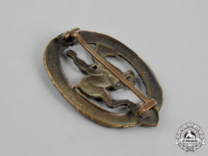 germany._an_equestrian_badge_and_stick_pin,_in_bronze,_by_christian_lauer_c18-019055