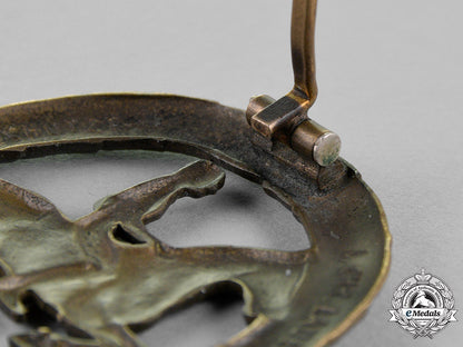 germany._an_equestrian_badge_and_stick_pin,_in_bronze,_by_christian_lauer_c18-019057