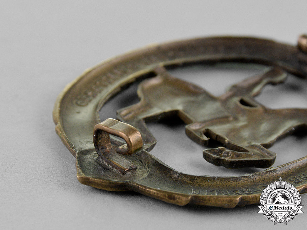 germany._an_equestrian_badge_and_stick_pin,_in_bronze,_by_christian_lauer_c18-019058