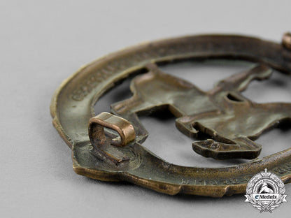 germany._an_equestrian_badge_and_stick_pin,_in_bronze,_by_christian_lauer_c18-019058