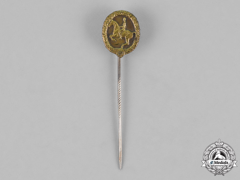 germany._an_equestrian_badge_and_stick_pin,_in_bronze,_by_christian_lauer_c18-019059