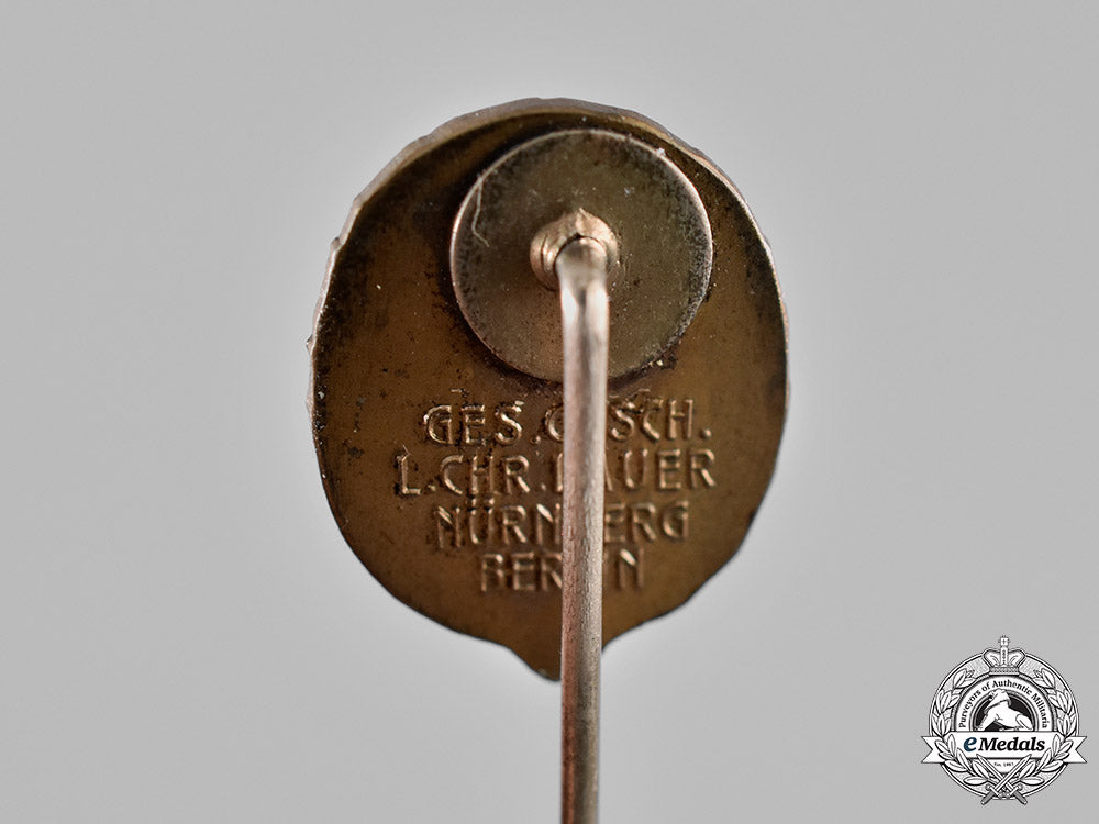 germany._an_equestrian_badge_and_stick_pin,_in_bronze,_by_christian_lauer_c18-019062