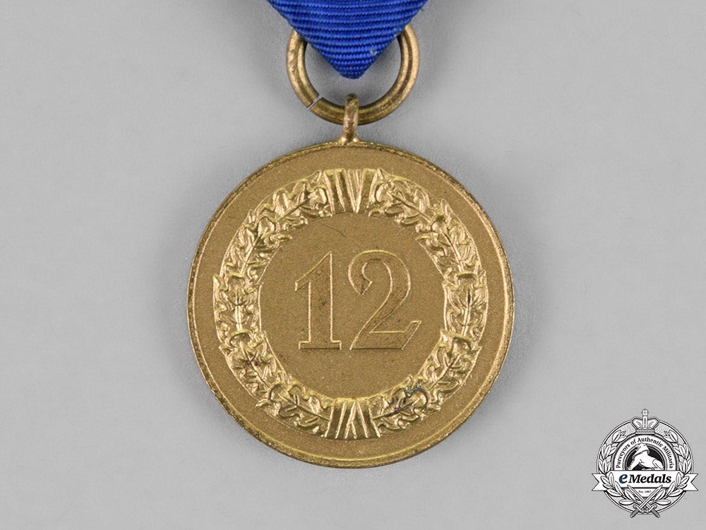 germany,_wehrmacht._a12-_year_long_service_medal_c18-019470