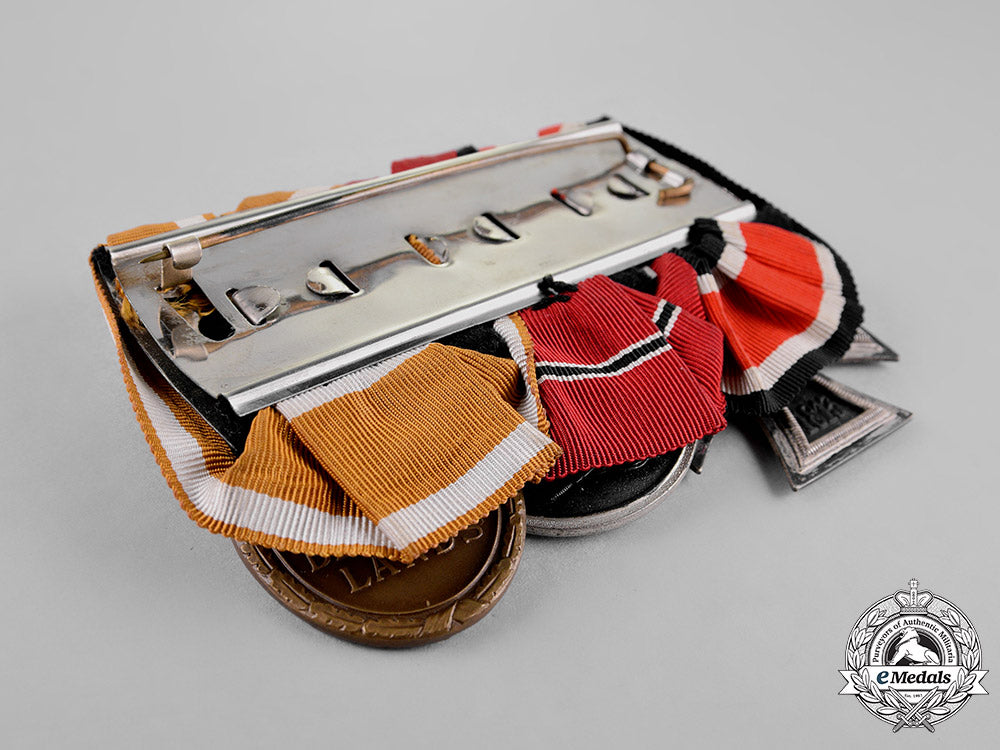 germany._a_medal_bar_with_three_medals,_awards,_and_decorations_c18-019581