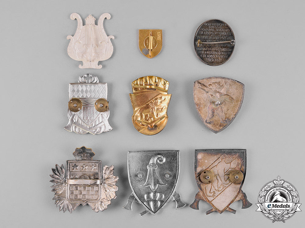 switzerland._a_lot_of_nine_insignia_c18-019976