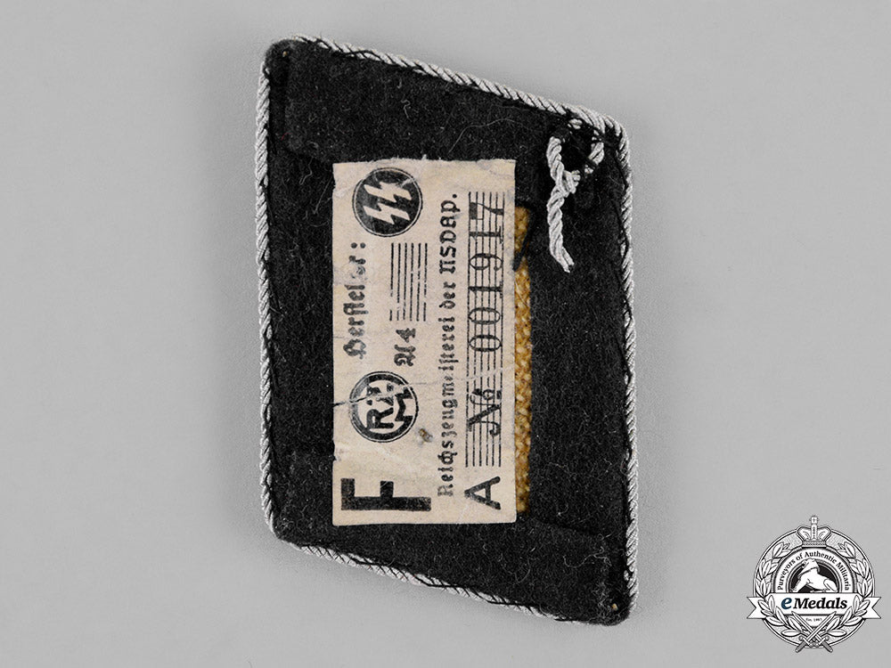 germany,_waffen-_ss._a_single_death’s_head_league5_th_storm_collar_tab,_rzm_tagged_c18-021371