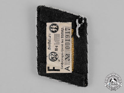 germany,_waffen-_ss._a_single_death’s_head_league5_th_storm_collar_tab,_rzm_tagged_c18-021371