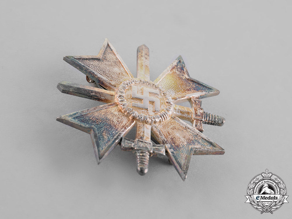 germany._a_war_merit_cross_first_class_with_swords,_cased,_by_deschler&_sohn_c18-021444_1