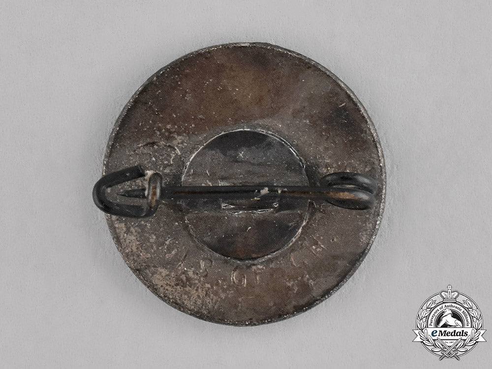 germany,_nsv._a_grouping_of_two_national_socialist_people’s_welfare_membership_insignia_c18-021827