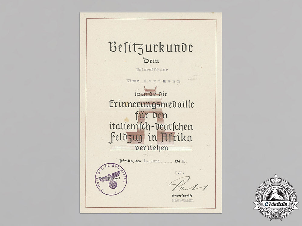 germany,_luftwaffe._a_collection_of_award_documents_to_feldwebel_elmar_hartmann(_afrika)_c18-021855