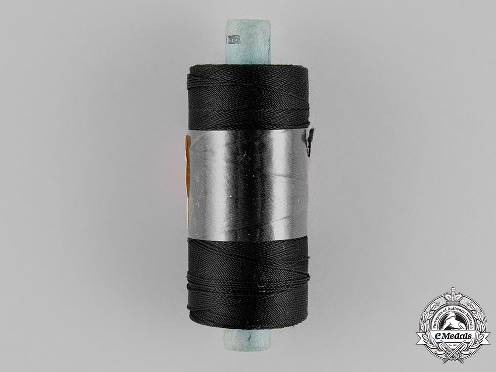 hermany,_hj._an_unused_spool_of_black_hj_thread,_rzm_tagged_c18-022045