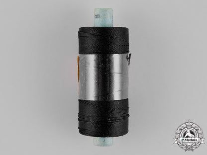 hermany,_hj._an_unused_spool_of_black_hj_thread,_rzm_tagged_c18-022045