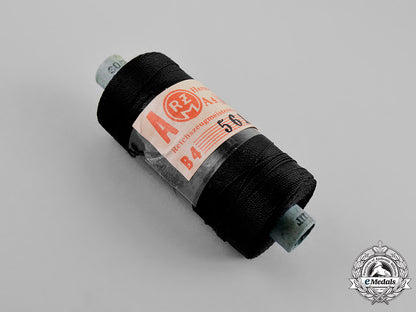 hermany,_hj._an_unused_spool_of_black_hj_thread,_rzm_tagged_c18-022046