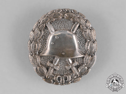 germany,_empire._a_wound_badge,_silver_grade,_with_matching_miniature_stick_pin_c18-022751