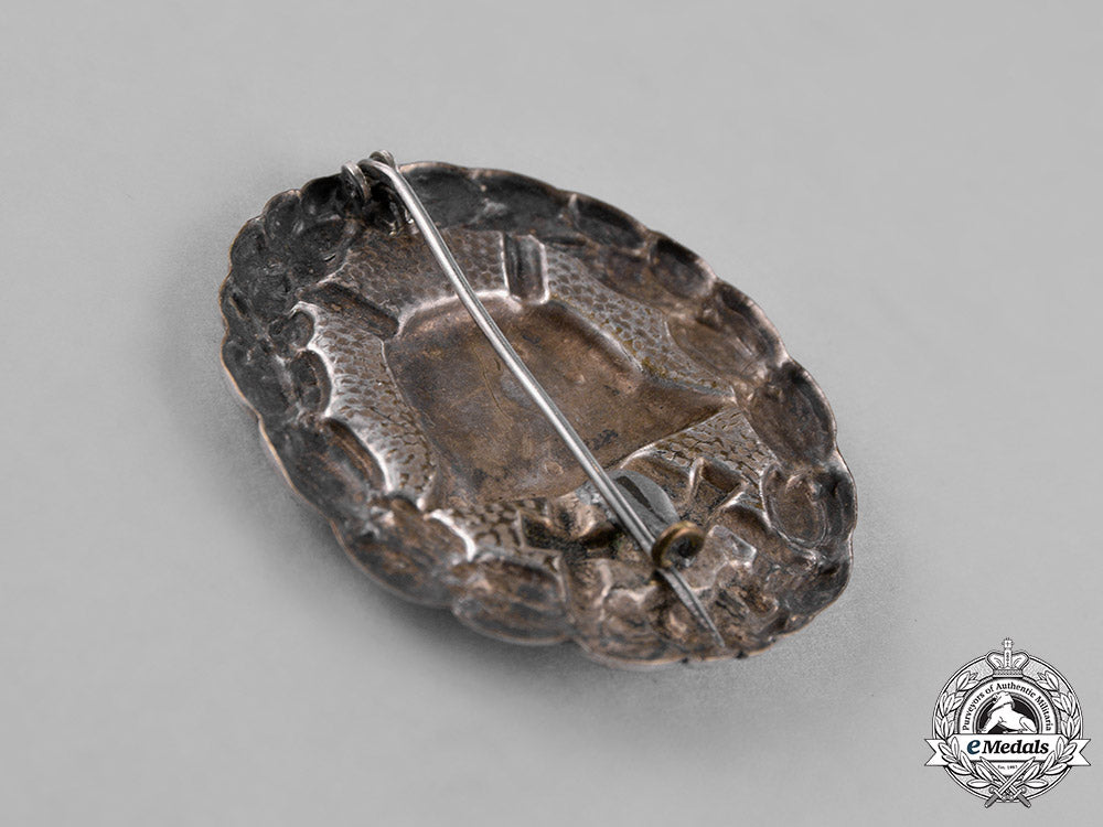 germany,_empire._a_wound_badge,_silver_grade,_with_matching_miniature_stick_pin_c18-022753