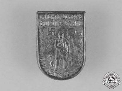 germany._a_winter_aid_of_the_german_people_donation_badge_c18-022954