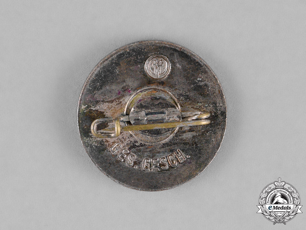 germany._a_nsdap_membership_badge_c18-022978