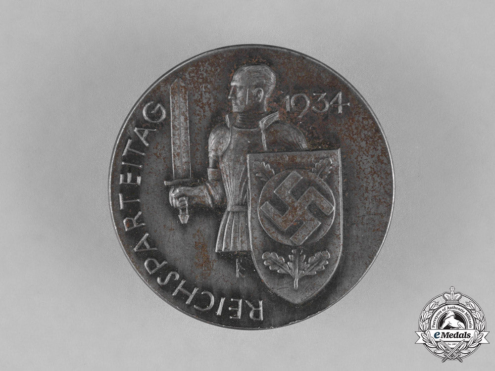 germany._a1934_nsdap_national_party_day_badge,_by_deschler&_sohn_c18-022999