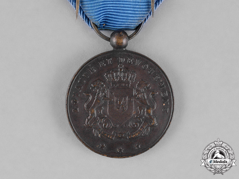 belgium,_kingdom._a_native_service_medal,_military_c18-023114
