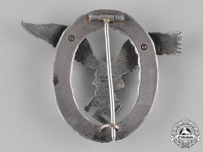 germany,_luftwaffe._a_pilot’s_badge_by,_c.e._juncker_c18-023163_2_1_1