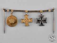Lippe. A Prussia-Lippe Miniature Medal Chain With Three Medals, Awards, And Decorations