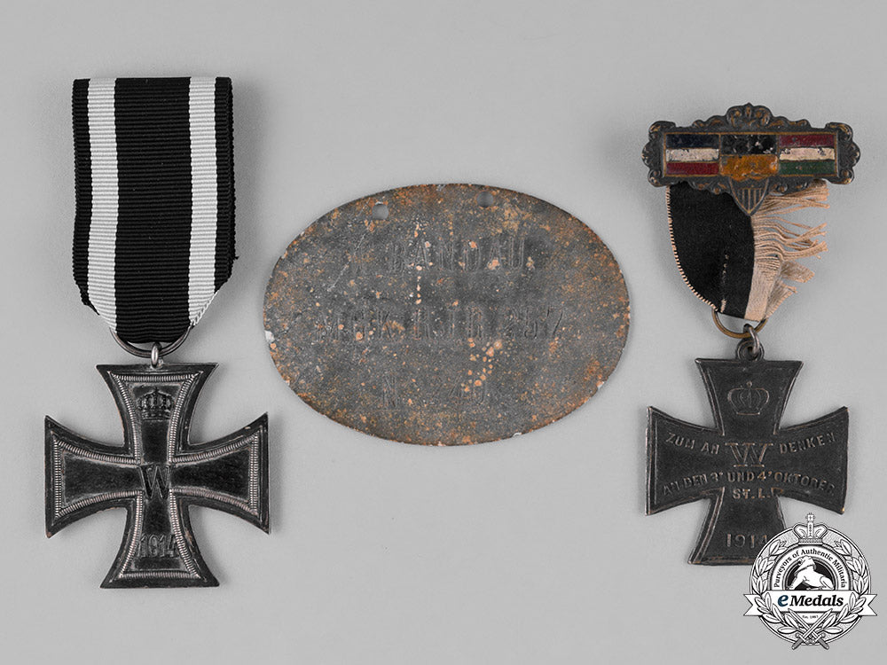prussia._a_first_war_period_identification_tag_accompanied_by_two_medals_and_awards_c18-023402_2_1