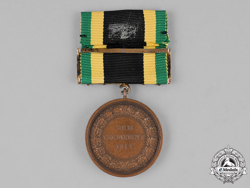 saxony,_kingdom._a_general_medal_of_merit,_bronze_grade,_with_sword_clasp_c18-023556