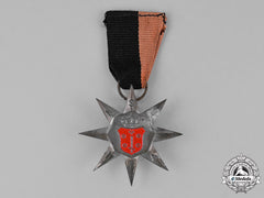 Netherlands, Kingdom. A National Socialist Movement (Nsb) "Flower Bulbs" March Badge 1943