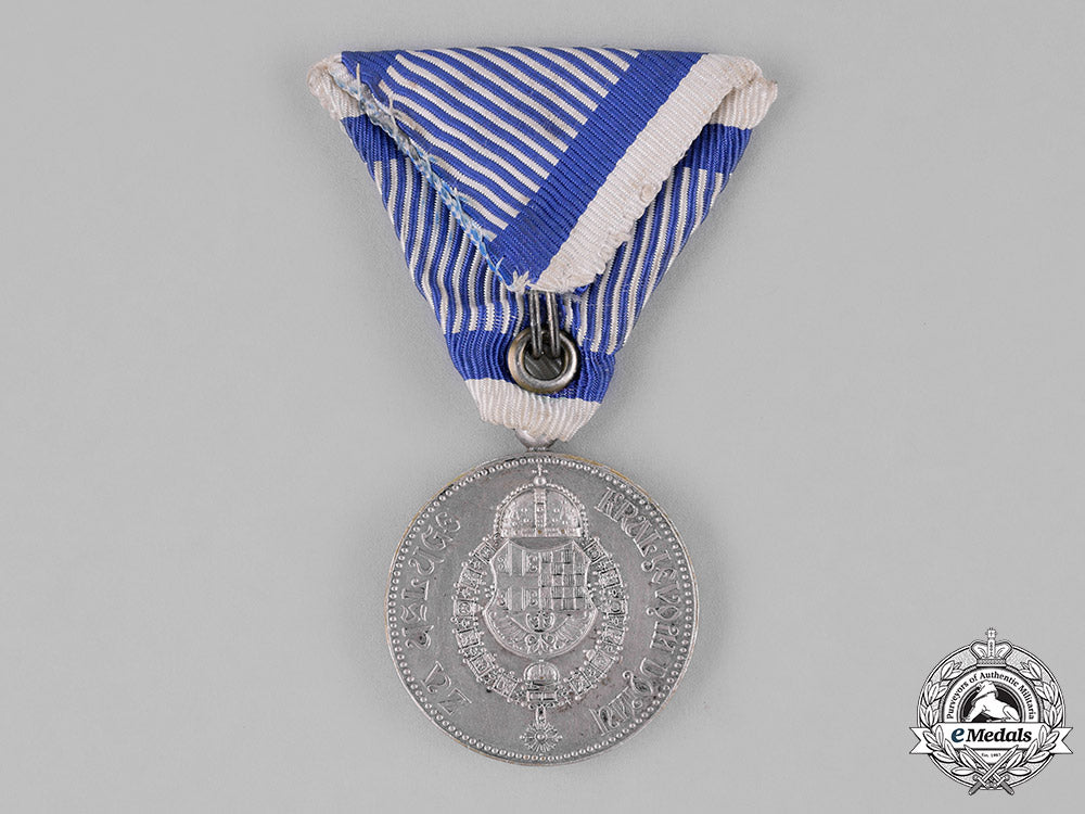 yugoslavia,_kingdom._a_royal_household_medal,4_th_class,_type_v(1927-1929)_c18-024854