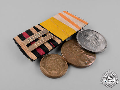 prussia,_state._a_medal_bar_with_three_medals,_awards,_and_decorations_c18-025554