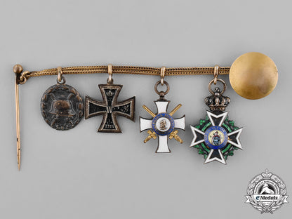 saxony,_kingdom._a_boutonniere_chain_with_four_medals,_awards,_and_decorations_c18-025557