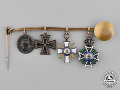 Saxony, Kingdom. A Boutonniere Chain With Four Medals, Awards, And Decorations