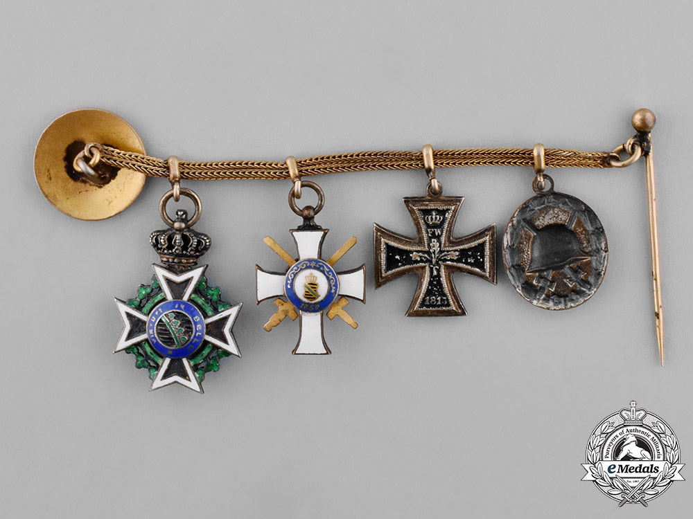saxony,_kingdom._a_boutonniere_chain_with_four_medals,_awards,_and_decorations_c18-025558