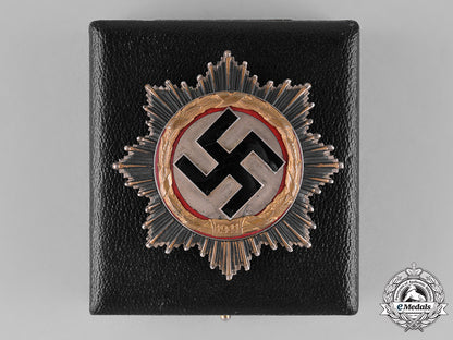 germany,_third_reich._a_cased_german_cross_in_gold,_by_deschler&_sohn_c18-026342