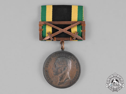 saxony,_kingdom._a_general_medal_of_merit,_bronze_grade,_with_sword_clasp_c18-026447_1_1