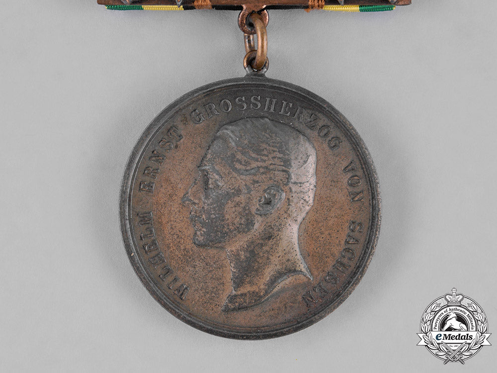 saxony,_kingdom._a_general_medal_of_merit,_bronze_grade,_with_sword_clasp_c18-026448_1_1