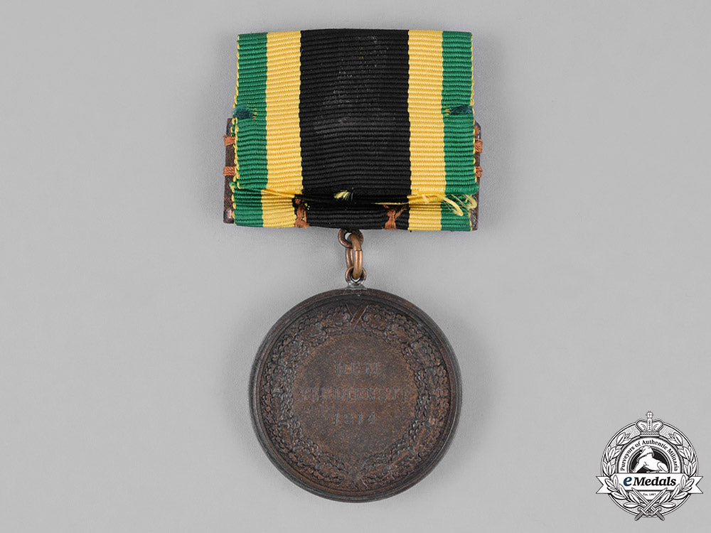 saxony,_kingdom._a_general_medal_of_merit,_bronze_grade,_with_sword_clasp_c18-026450_1_1