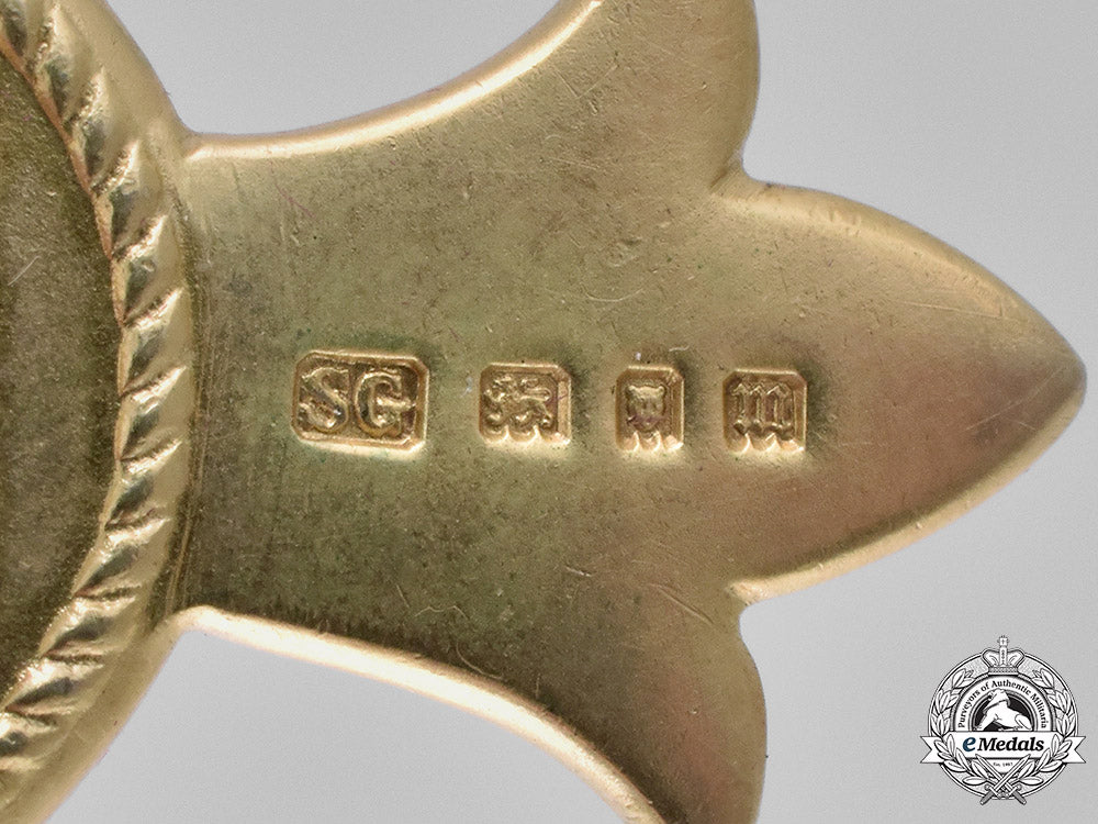 united_kingdom._a_most_excellent_order_of_the_british_empire,_officer_badge,_obe,_civil_division,_type_i_c18-027347
