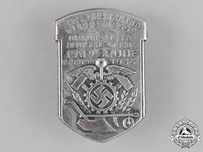 germany._a1934_karlsruhe_border-_countries_boycott_fair_badge_c18-027489