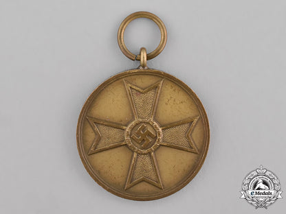 germany,_third_reich._a_set_of_three_war_merit_crosses_and_medals_c18-027524