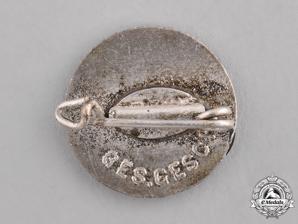 germany,_third_reich._a_german_red_cross(_drk)_lapel_badge_c18-027553