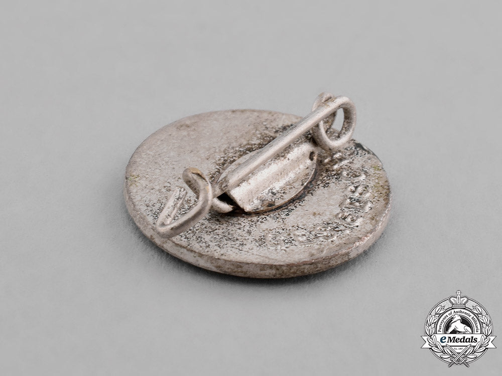 germany,_third_reich._a_german_red_cross(_drk)_lapel_badge_c18-027554