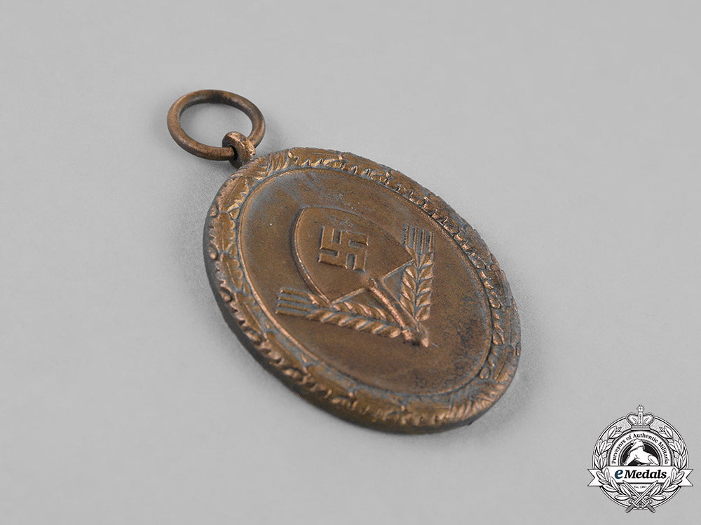 germany,_third_reich._three_third_reich_german_medals,_awards,_and_decorations_c18-030215