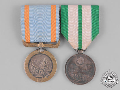 japan,_empire._two_commemorative&_service_medals_c18-032296