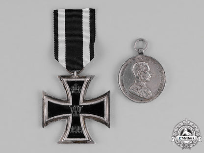 austria_and_germany,_imperial._a_grouping_of_a_silver_austrian_bravery_medal,_second_class,_and_a1914_iron_cross,_second_class_c18-033427