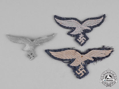 germany,_luftwaffe._three_of_luftwaffe_eagle_insignia_c18-033771