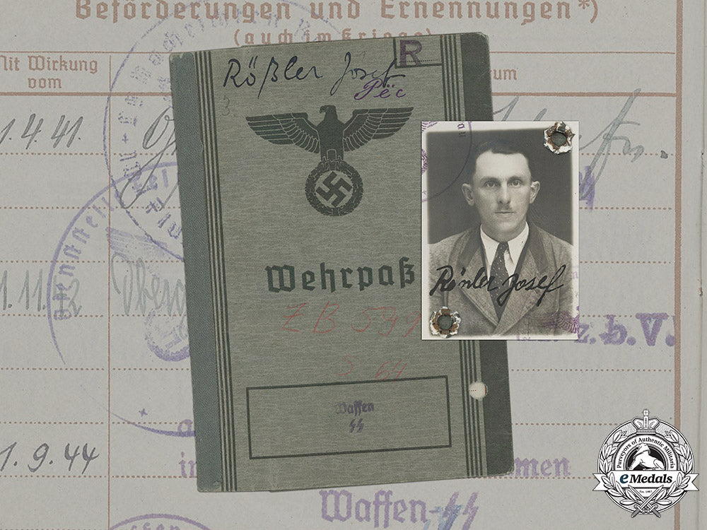 germany,_luftwaffe/_ss._a_wehrpaß_to_luftwaffe_signals_obergefreiter,_later_ss-_totenkopf_guard_in_kzs_mittelbau_and_sachsenhausen_c18-034251