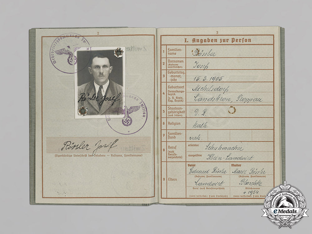 germany,_luftwaffe/_ss._a_wehrpaß_to_luftwaffe_signals_obergefreiter,_later_ss-_totenkopf_guard_in_kzs_mittelbau_and_sachsenhausen_c18-034254