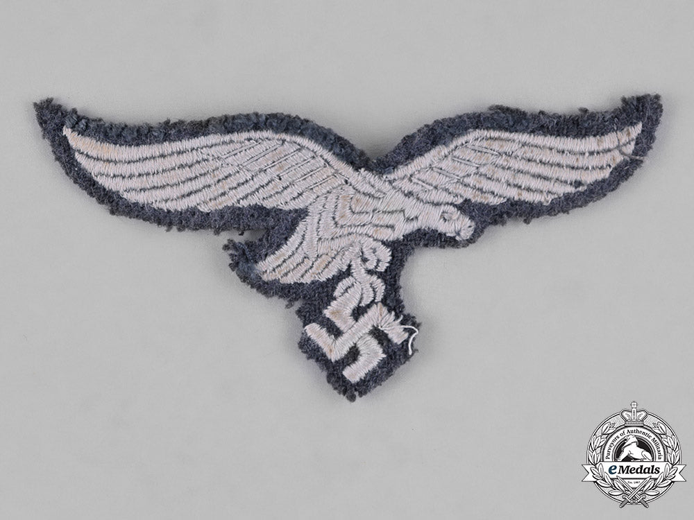 germany,_luftwaffe._a_group_of_uniform_insignia_c18-034558